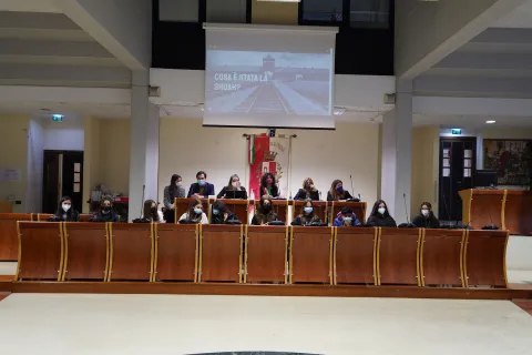 Momenti dell'incontro nel Consiglio comunale  